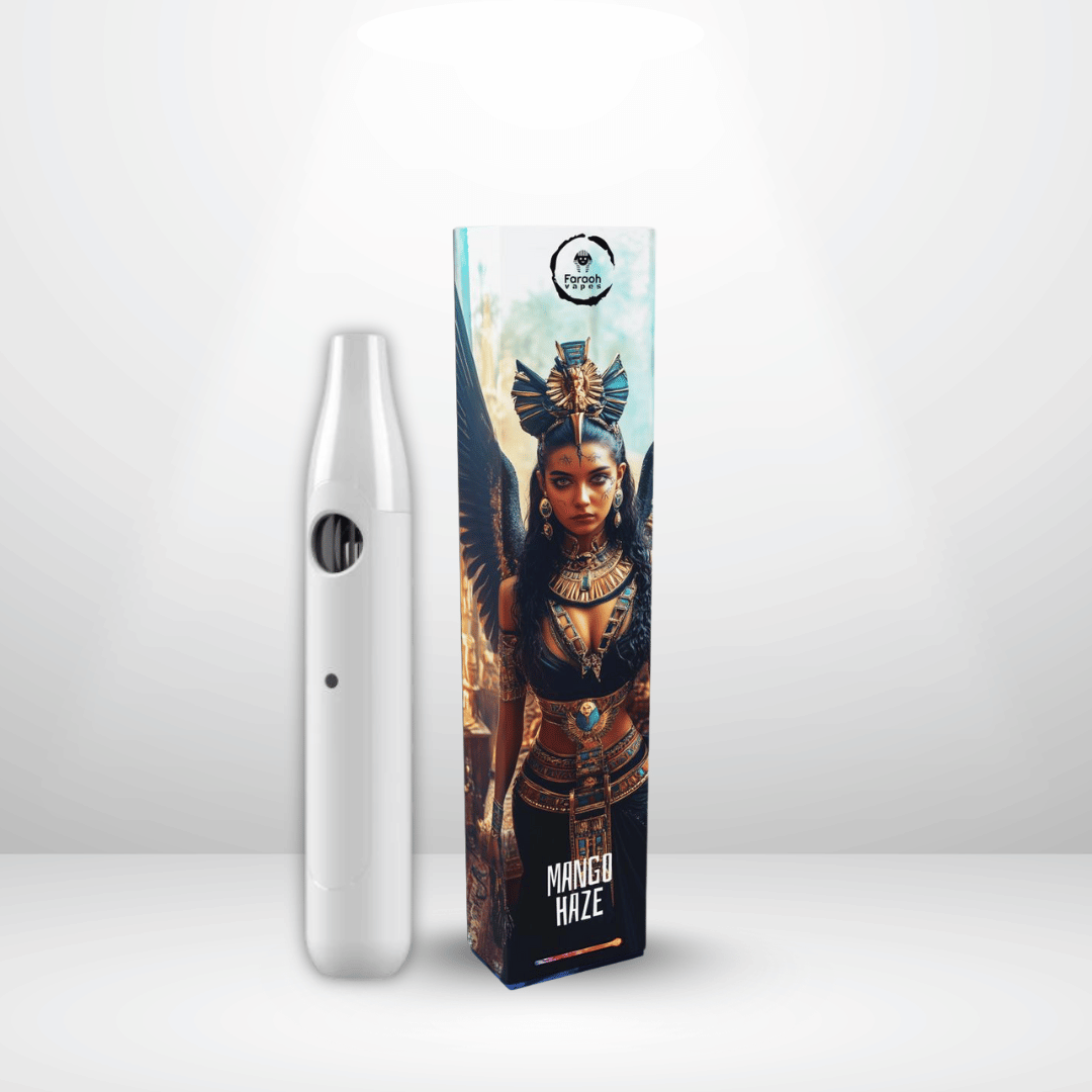 En elegant vit CCELL Vulkano vape penna står bredvid en livlig Faraoh THCB/THCHO Engångsvape 35% 1ml låda med en illustrerad bevingad kvinna i egyptisk klädsel, som visar Mango Haze-smaken och en rund logotyp högst upp.
